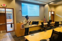 Student-Moses-Yazachew-practicing-his-elevator-pitch-in-front-of-large-group